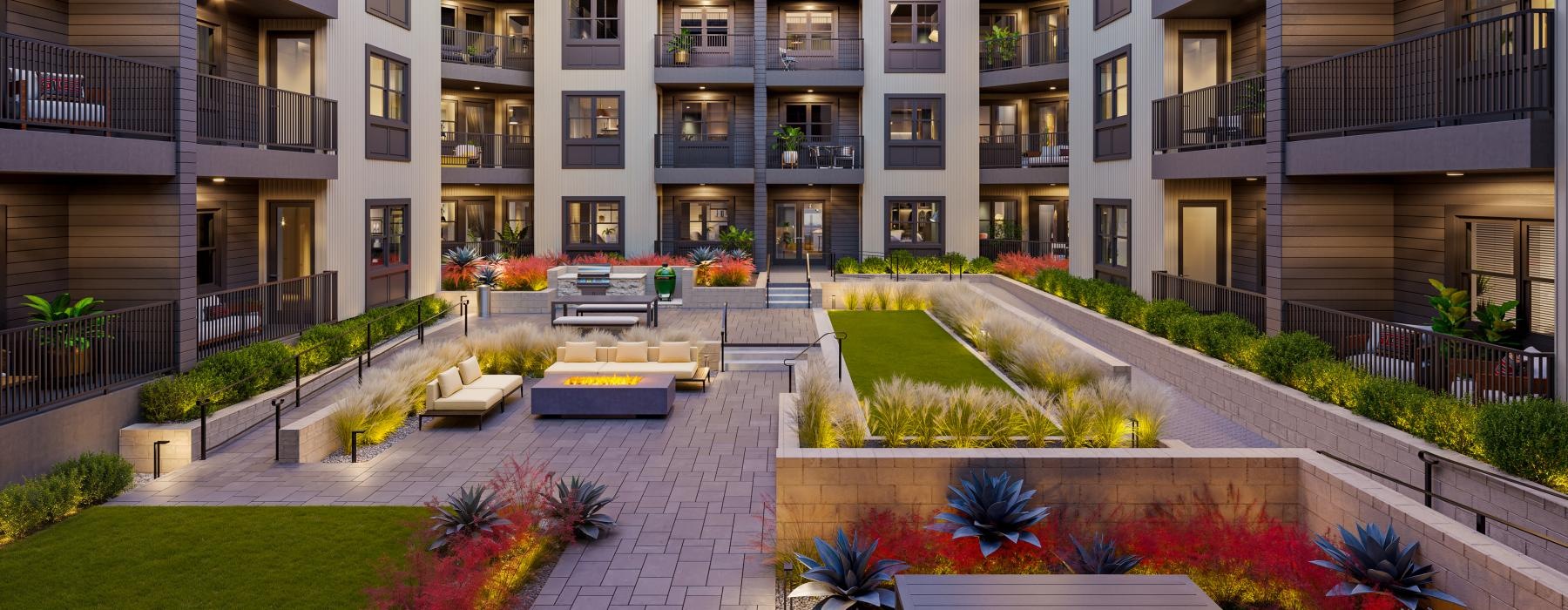 a courtyard with benches and plants