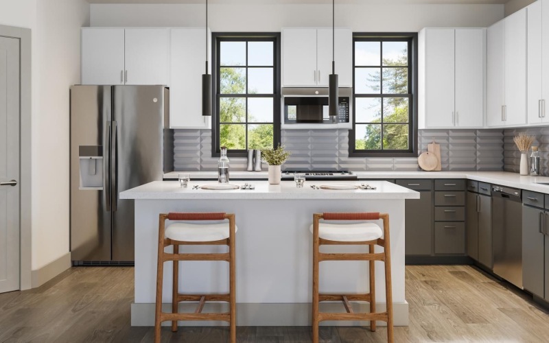a kitchen with white cabinets